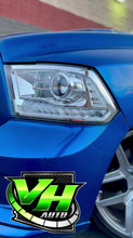 Load and play video in Gallery viewer, 09-18 Dodge Ram “R/T Style Switchback Sequential Clear Corner” Headlights