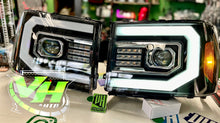 Load image into Gallery viewer, 07-13 GMC Sierra LED DRL "Alpha C Bar” Switchback Sequential Projector Headlamps