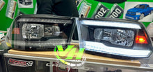 Cargar imagen en el visor de la galería, 09-18 Dodge Ram DUAL SEQUENTIAL LED Reflector Headlights
