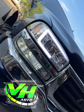 Load image into Gallery viewer, 99-06 GMC Sierra Yukon &quot;Gen 2 C Bar Projector&quot; Headlights
