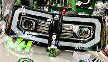 Cargar imagen en el visor de la galería, 07-13 GMC Sierra LED DRL &quot;Alpha C Bar” Switchback Sequential Projector Headlamps
